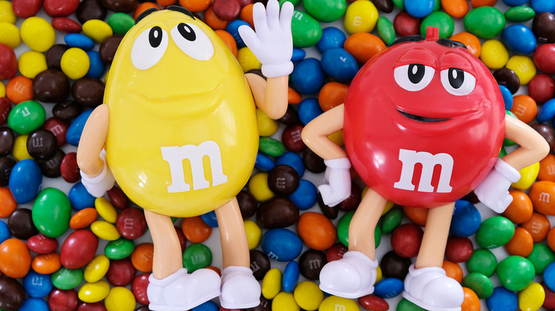 M&M mascot on M&M pile