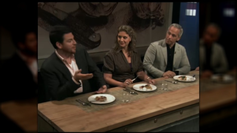 Scott Conant, Amanda Freitag, and Geoffrey Zakarian at the judges' table on Chopped