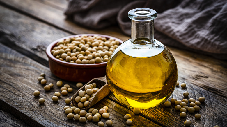 Soy beans in bowl and soy bean oil