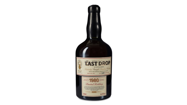 Bottle of Last Drop 1980 bourbon on a white background
