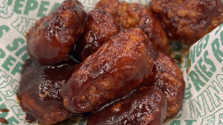 Close-up of Wingstop chicken wings with sauce