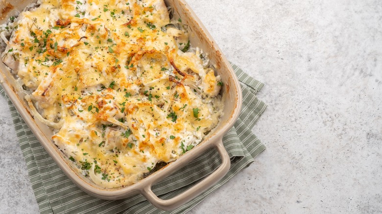 seafood casserole in a light brown casserole dish
