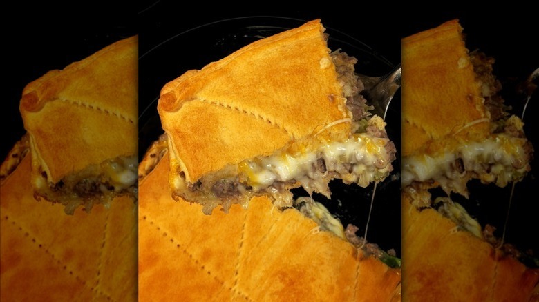 slice of runza casserole being taken out of the dish