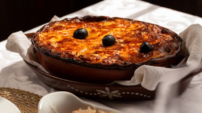 Portuguese cod casserole in a ceramic baking dish