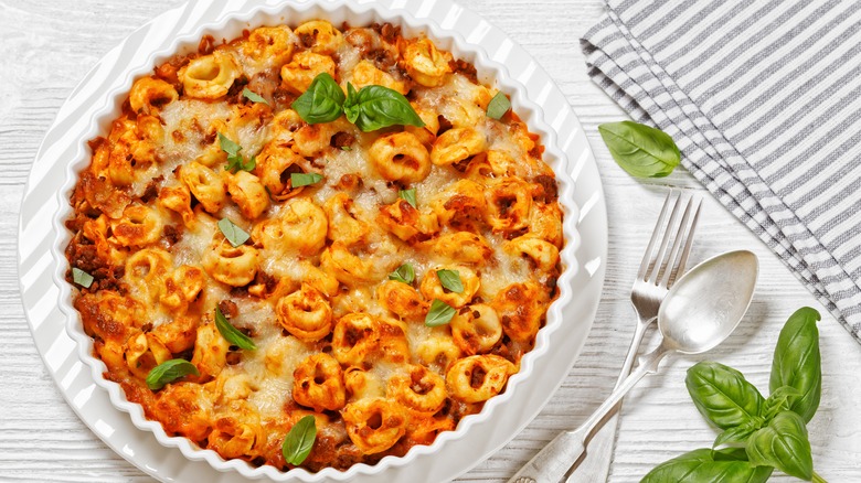tortellini bake on a white ceramic dish