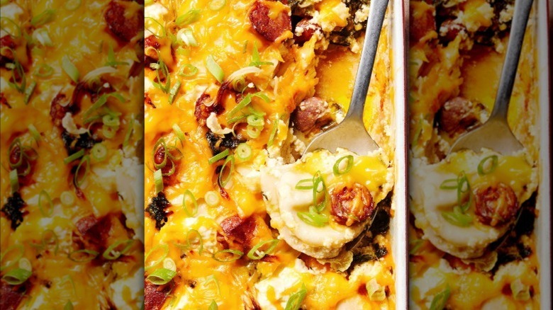 close up of a spoon scooping part of a pierogi casserole