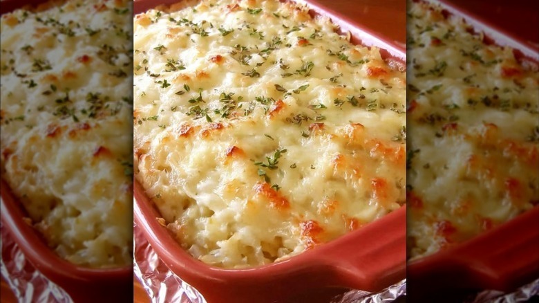 sweet onion casserole in a red casserole dish