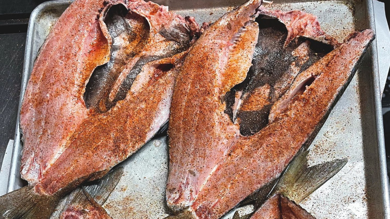 smoked mullet butterflied on a baking pan
