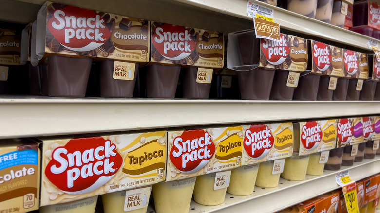 Various flavors of Snack Pack pudding on a store shelf