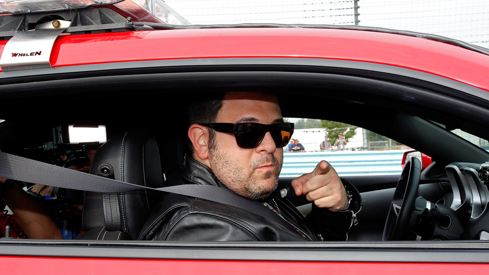 Adam Richman sitting in car