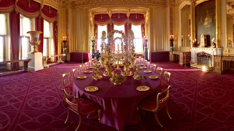gold plates on red table