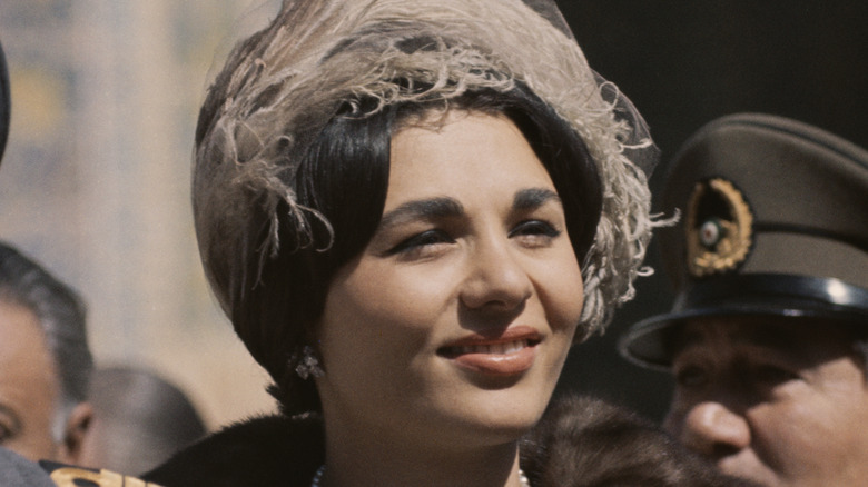 queen farah of iran smiling