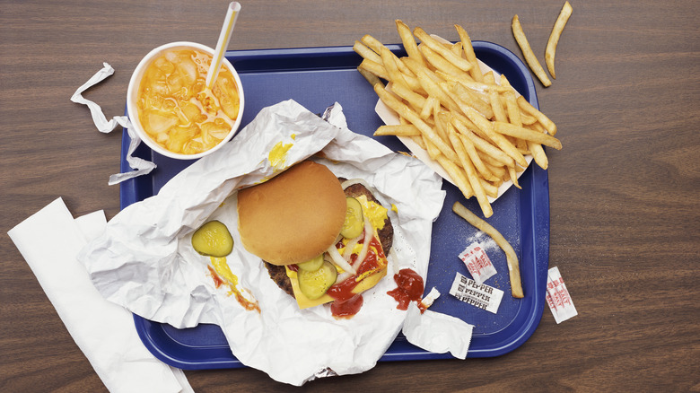 Burger with fries and drink