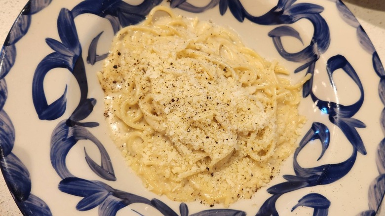 Cacio e pepe from Eataly in a white bowl with blue designs
