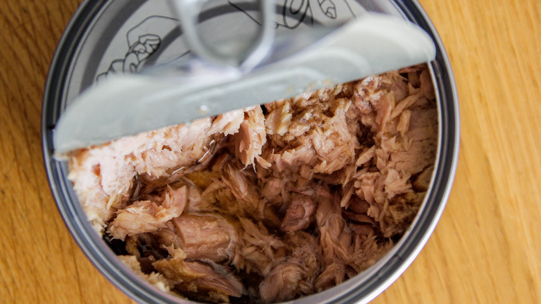Partially open can of tuna