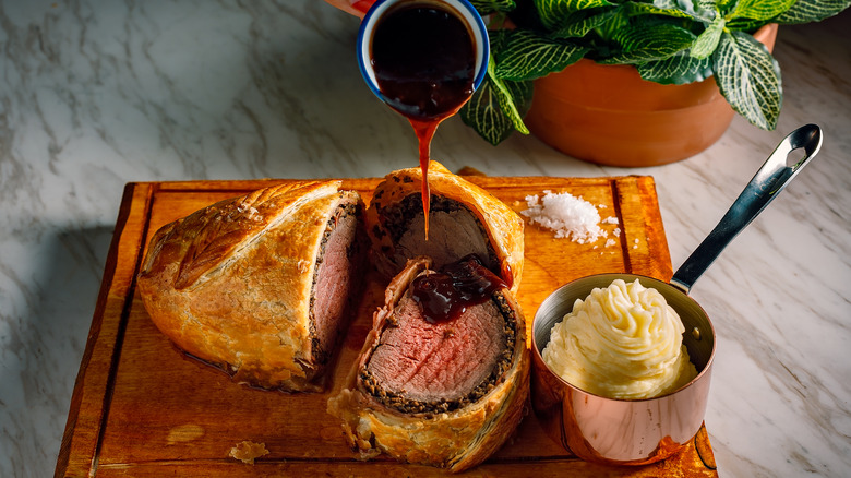 Beef Wellington With Potatoes and Sauce