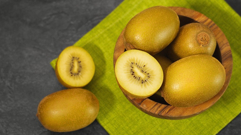 Bowl of Whole and Halved Kiwis