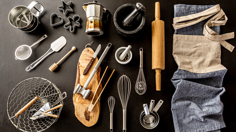 Table with kitchen tools on it 