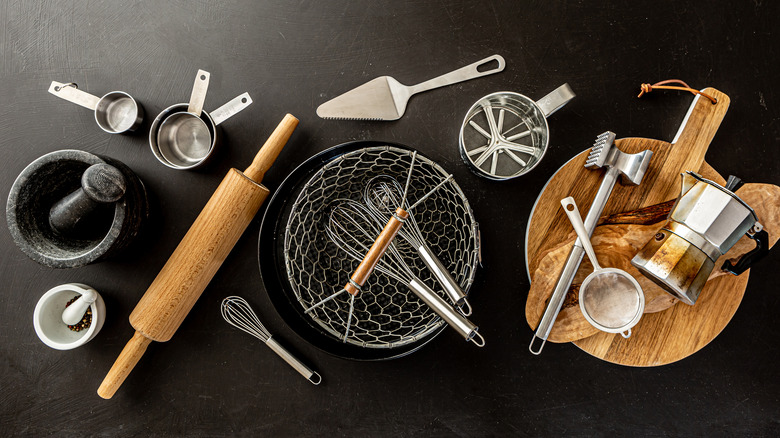 kitchen tools on black counter