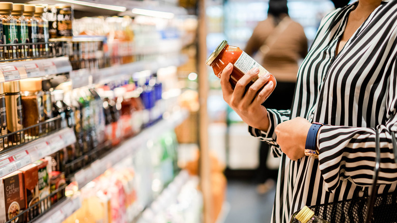 looking at grocery cans