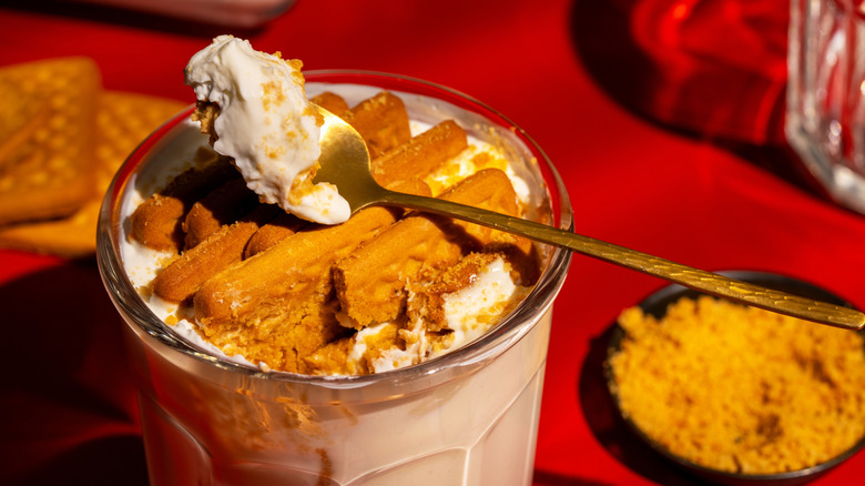 Two-ingredient Japanes style cheesecake in a glass with a spoon on top