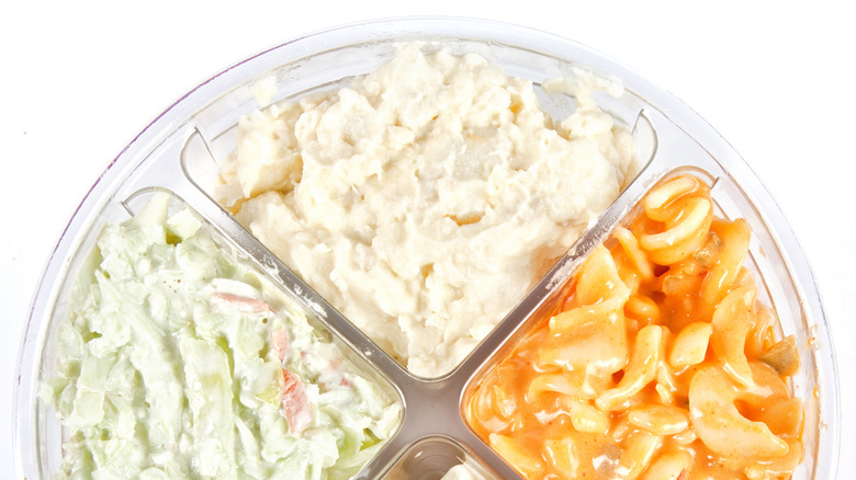 Store-bought potato salad in plastic container