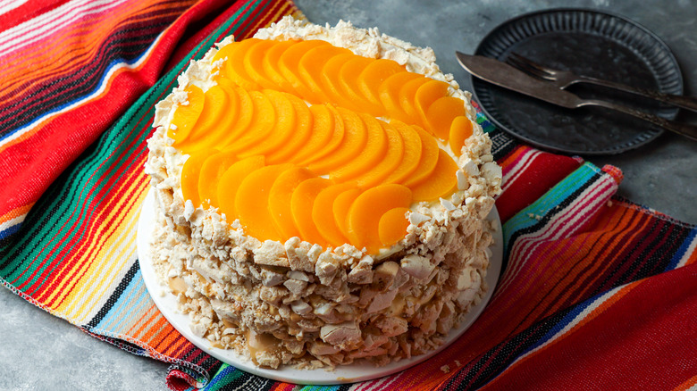 Chajá cake with peach decoration