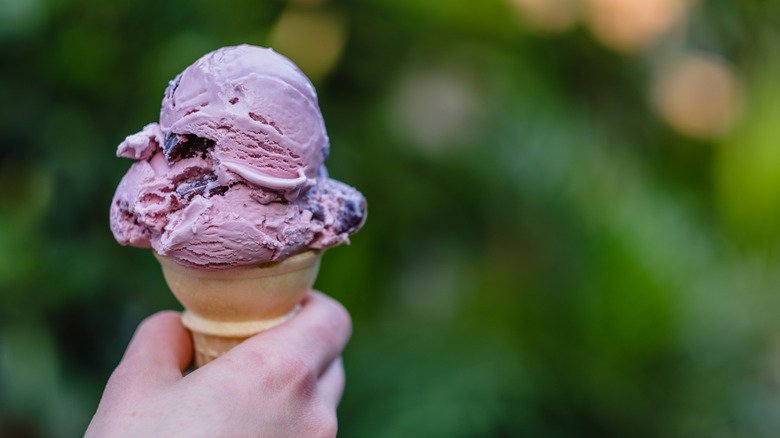 Purple ice cream in a cone