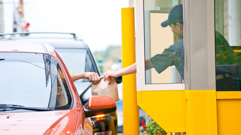 Receiving food at drive-thru 