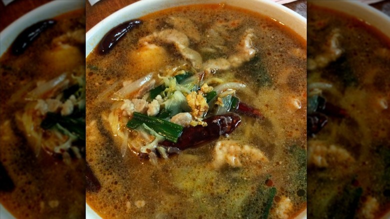 Cho Ma Mein soup with shrimp and pork in a white bowl