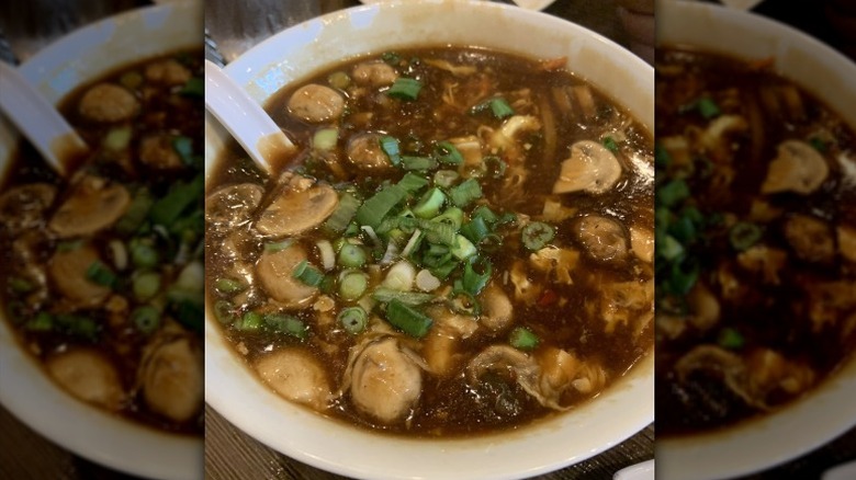 A white bowl of hot and sour soup
