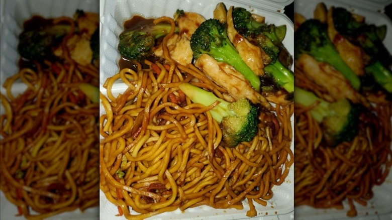 Chicken broccoli lo mein in a to-go container