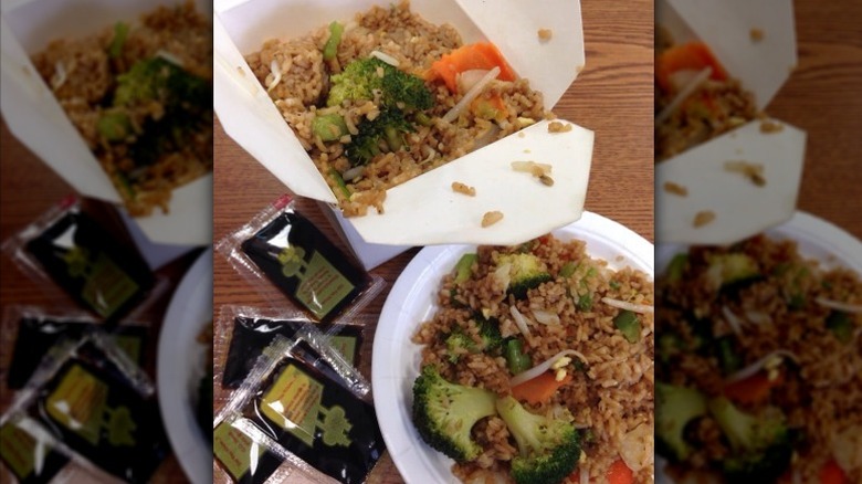 Fried rice with vegetables in a to-go container