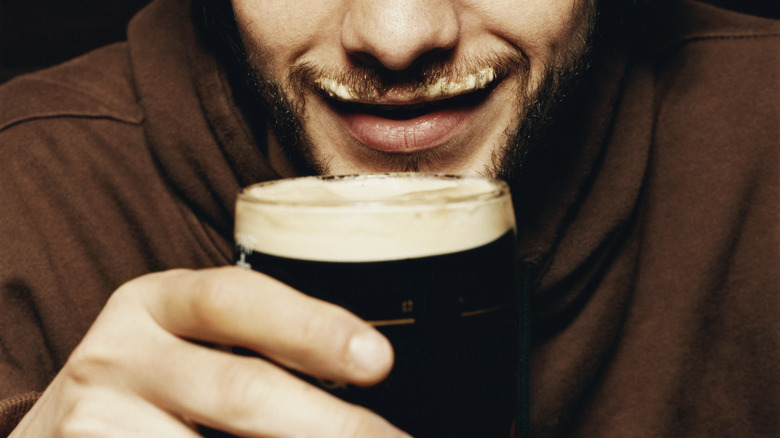 mustache with Guinness trapped within