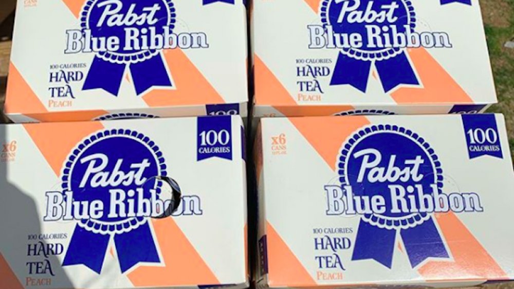 four cases of PBR Hard Tea Peach