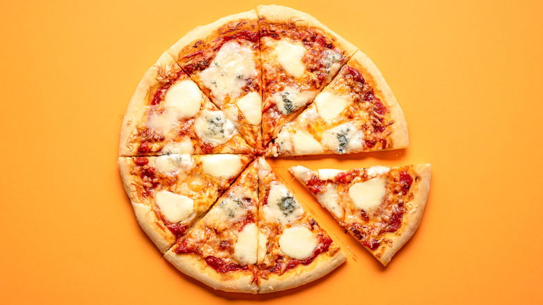 pizza on orange background