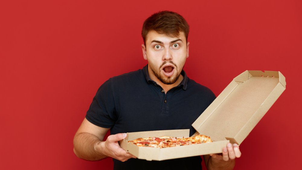 surprised guy and pizza