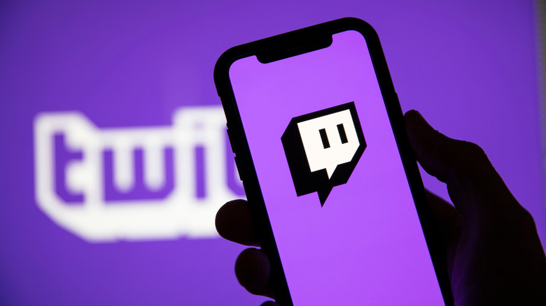 Purple Twitch logo on phone