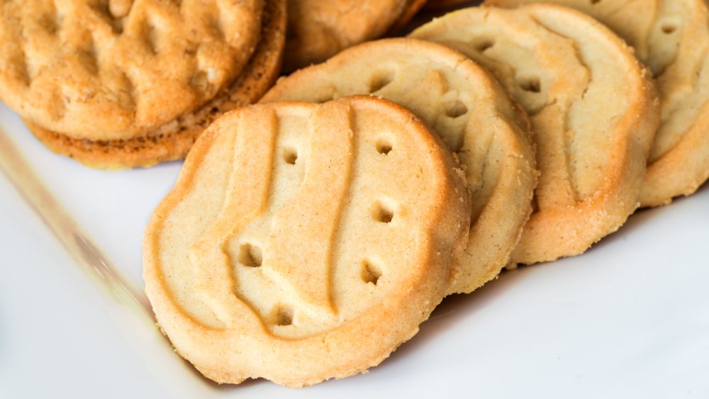 assorted girl scout cookies on white plate