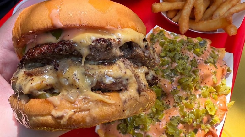 Closeup of burger and sides