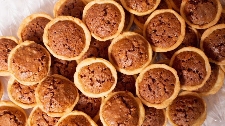 A tray of pecan tassies.