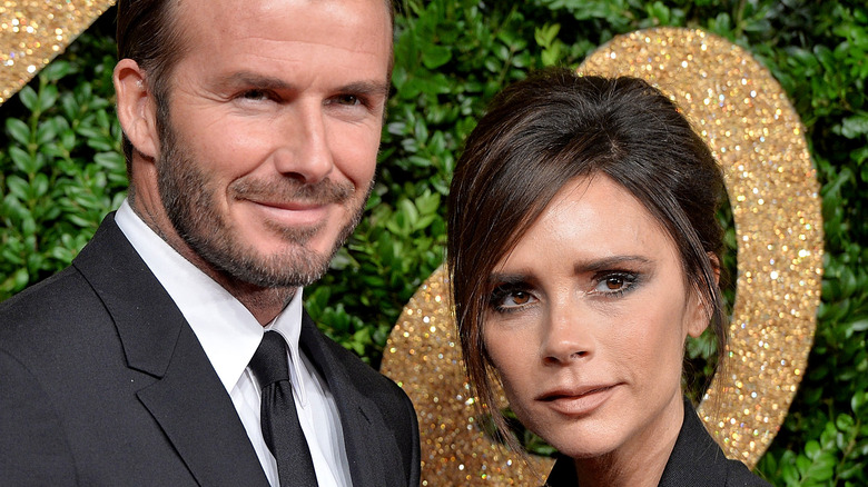 David and Victoria Beckham smiling