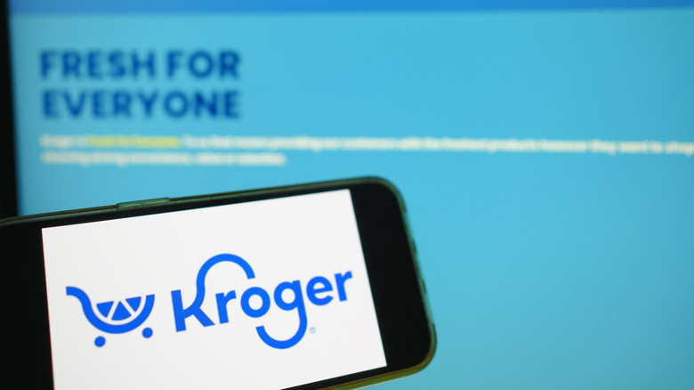kroger logo on phone and website