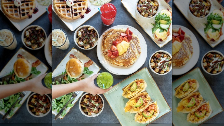 Various breakfast and brunch dishes on table