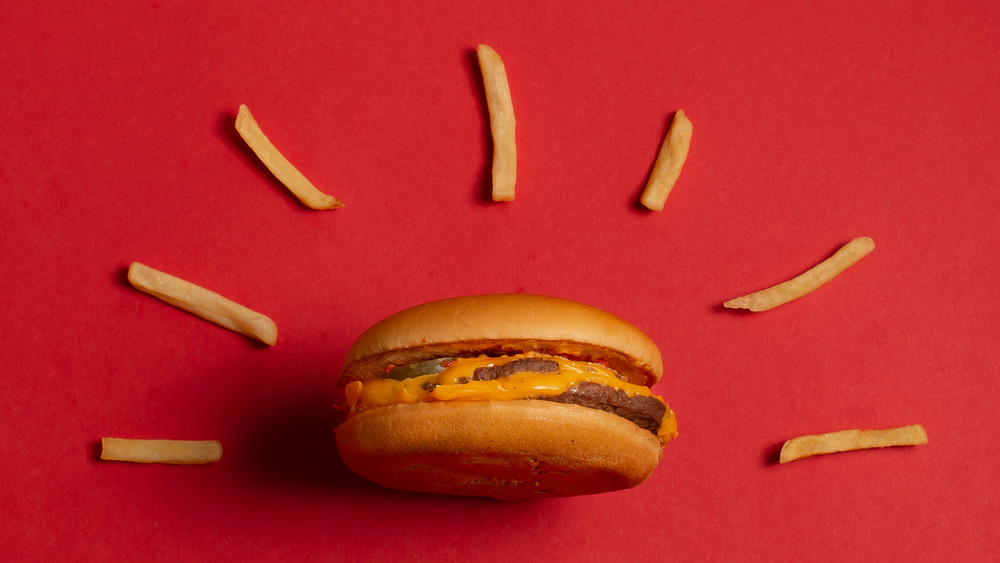 McDonald's burger on red with fry halo