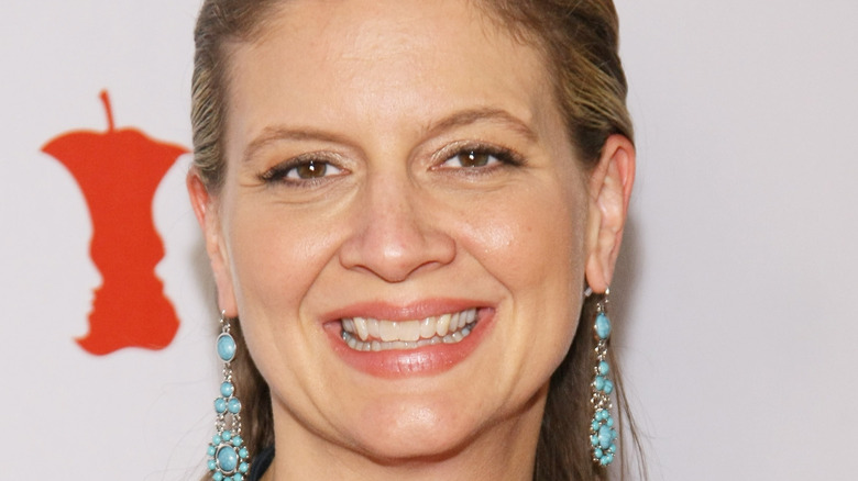 Amanda Freitag smiles with dangling earrings