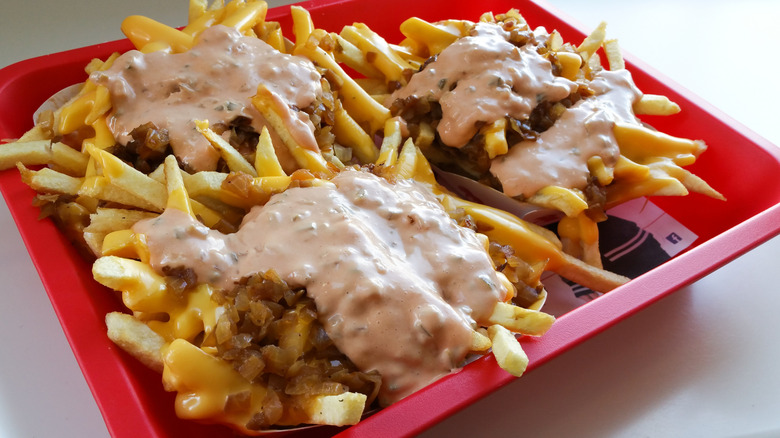 Tray of In-N-Out animal-style fries with sauce