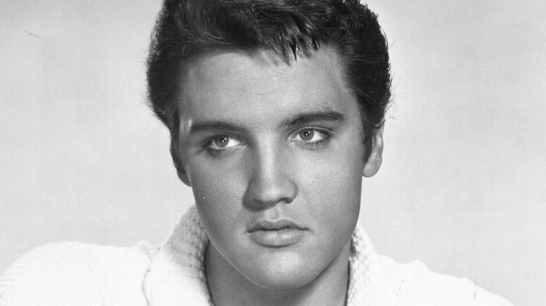 Black and white photo of young Elvis Presley