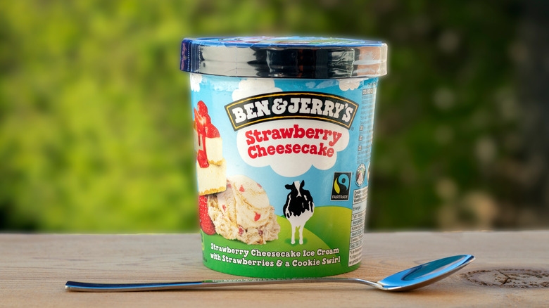 Ben & Jerry's strawberry cheesecake ice cream with green background