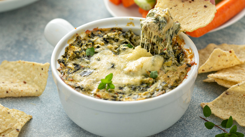 Artichoke spinach dip with cheese pull